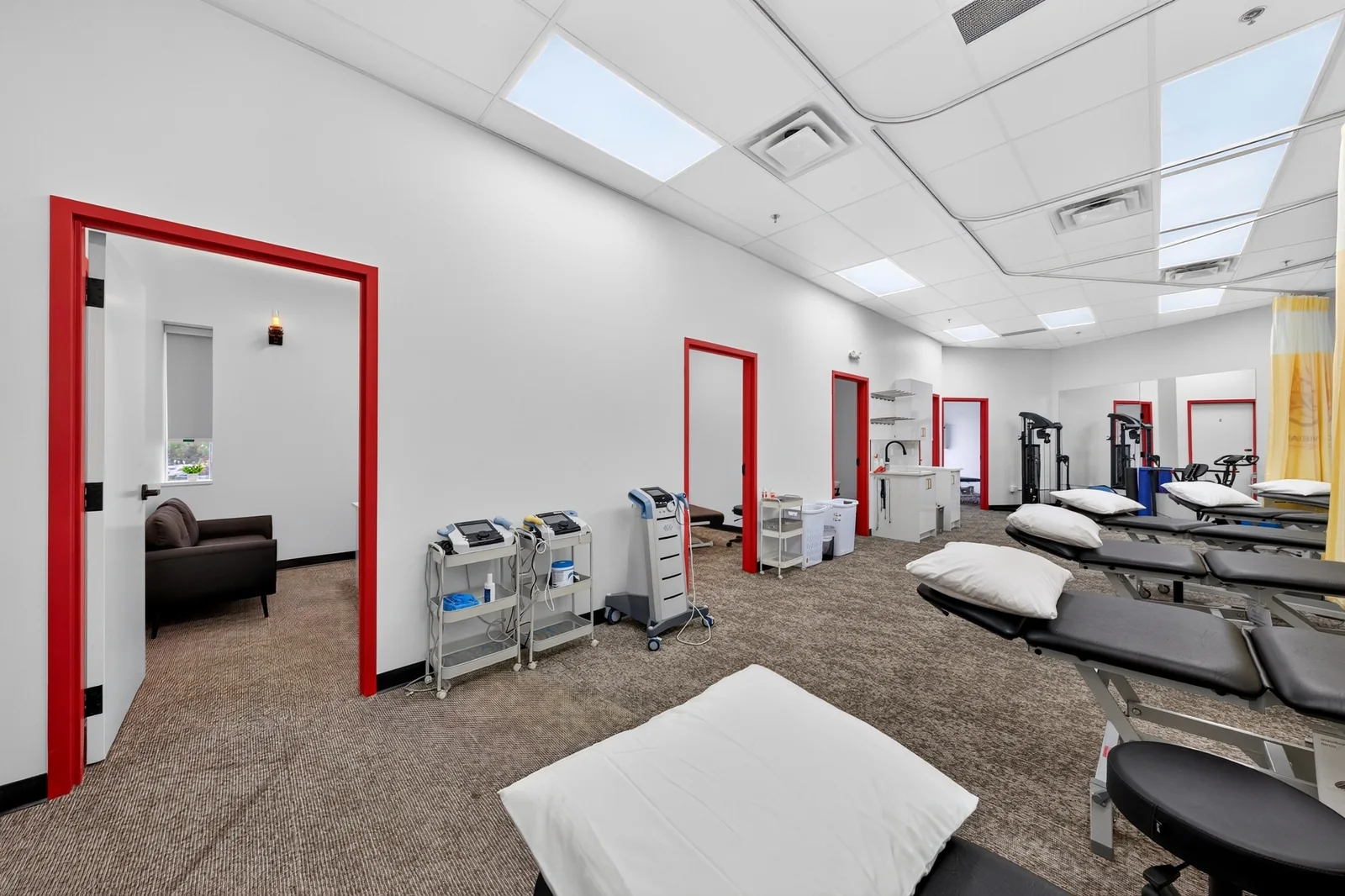 Real photograph inside Power Physiotherapy and Massage, showing treatment rooms and rehabilitation equipment